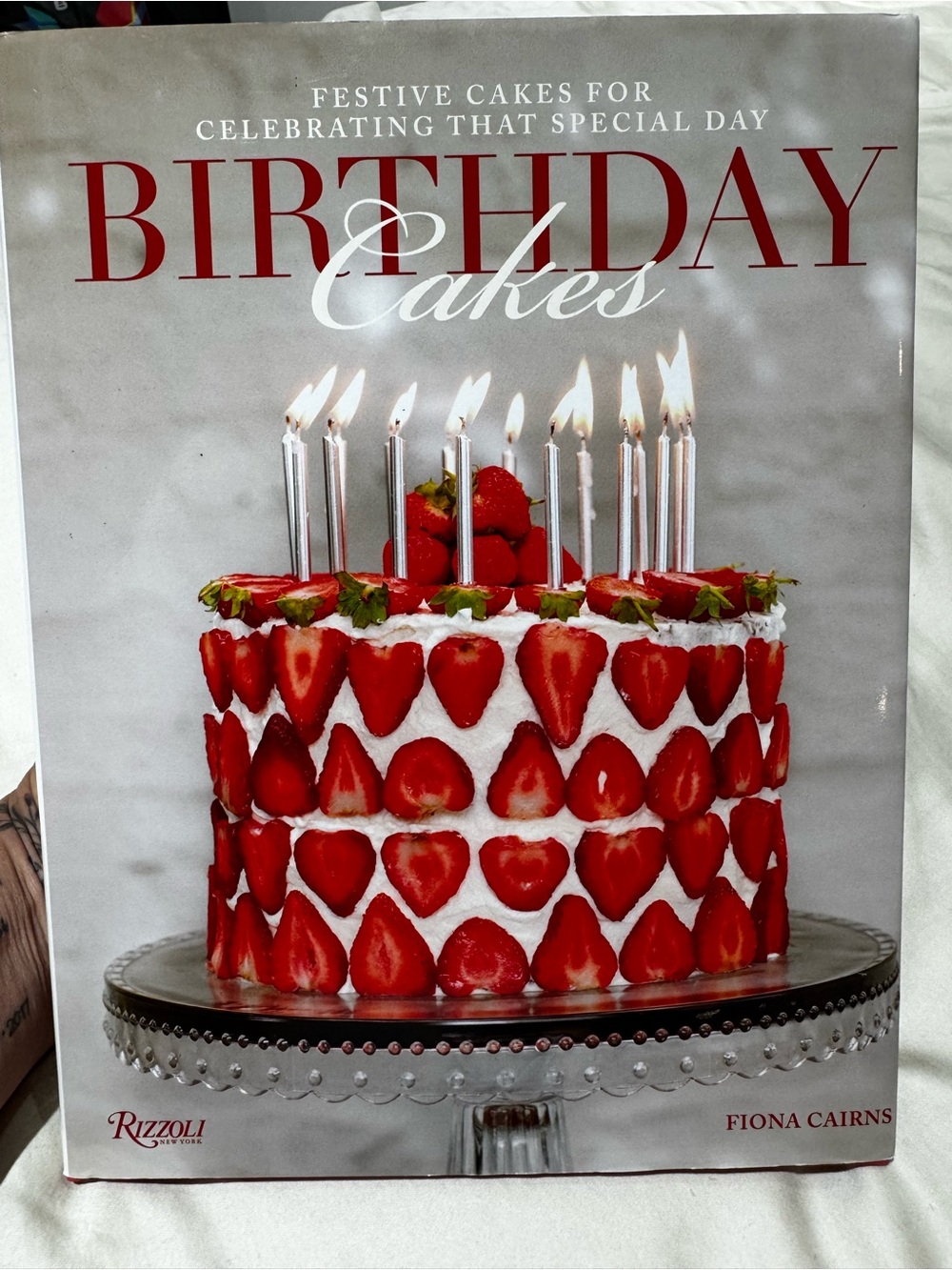 Rizzoli Birthday Cakes Cookbook Cover — Red and White Strawberry Layer Cake
